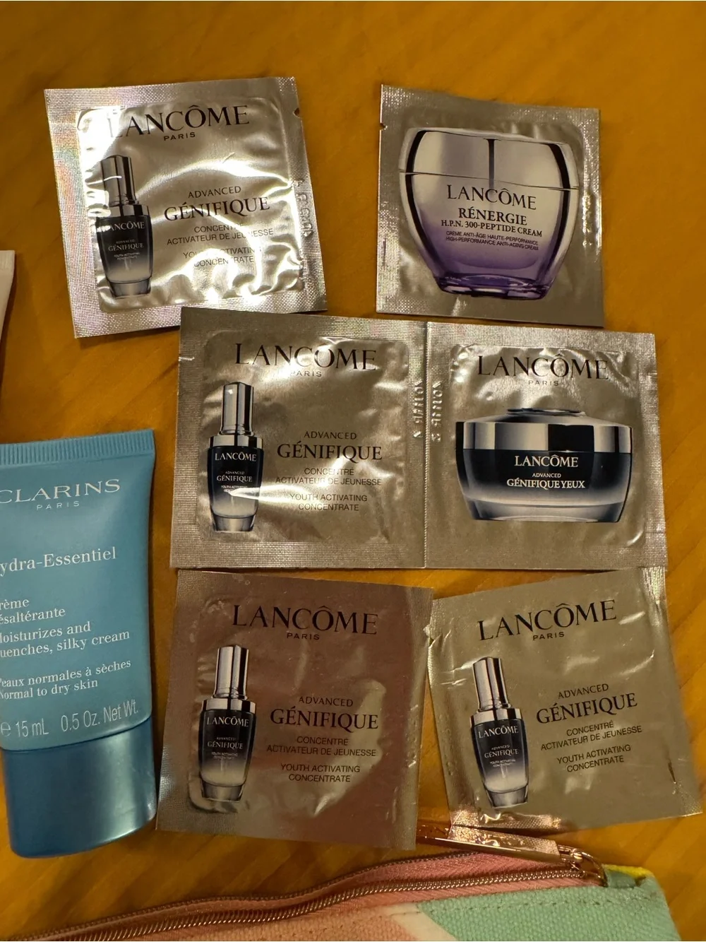Clarins Pouch with Clarins and other product samples